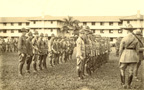 Troops march in review