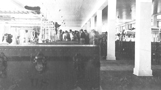 Men inside barracks