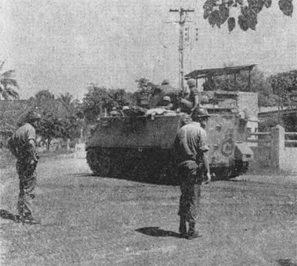 PFC James Schmuck searches vehicle