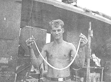 PFC Donald Hogan with snake