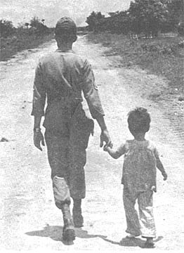 SSG Warner Orlandi and child