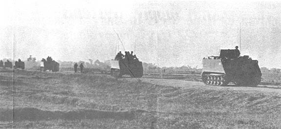 Convoy of APCs