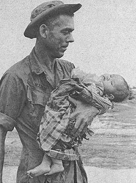 SSG Edgar Bledsoe hold ill child