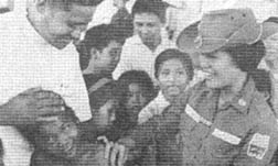 Cpt Jaidi Silverio innoculates schoolgirl