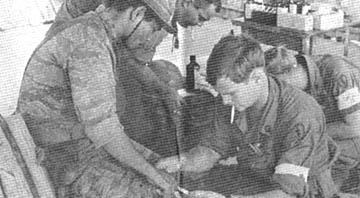 SP5 Robert Bagshaw bandages ARVN