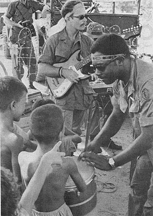 Children try the conga drum