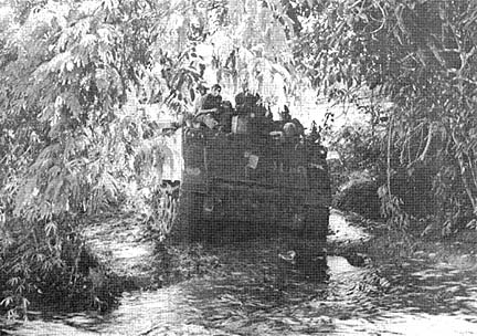 Crossing Cambodian Stream