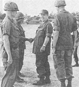 FSG James J. Powell shakes hands with Senator Yarborough