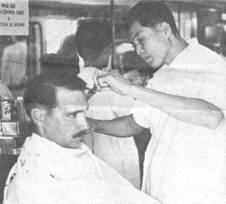 CW2 Ronnie Robiannette gets haircut